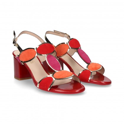 OVAL HEEL SANDAL IN FRONT OF RED MIRROR
